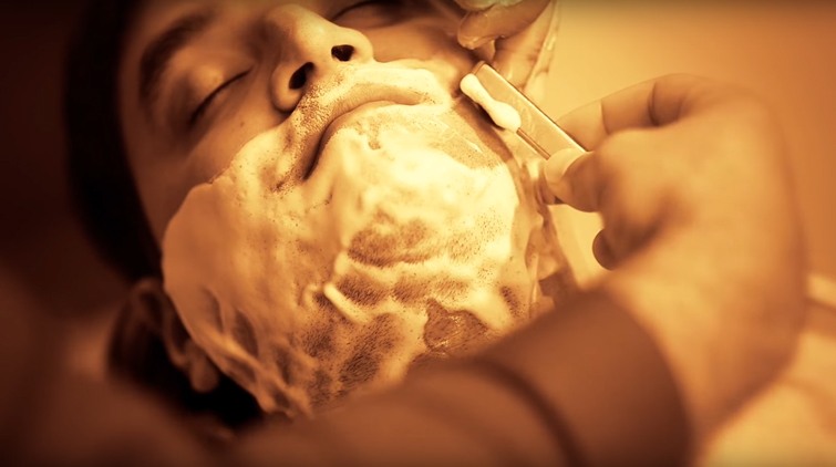 The barber would then carefully stretch the skin taught, section by section, to create an even surface. 